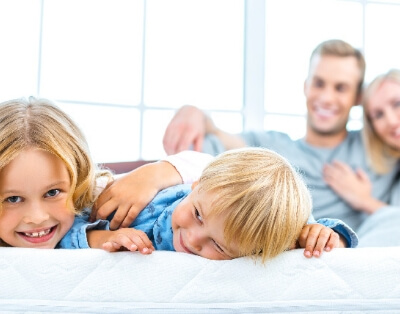 Children With Parents In Bed